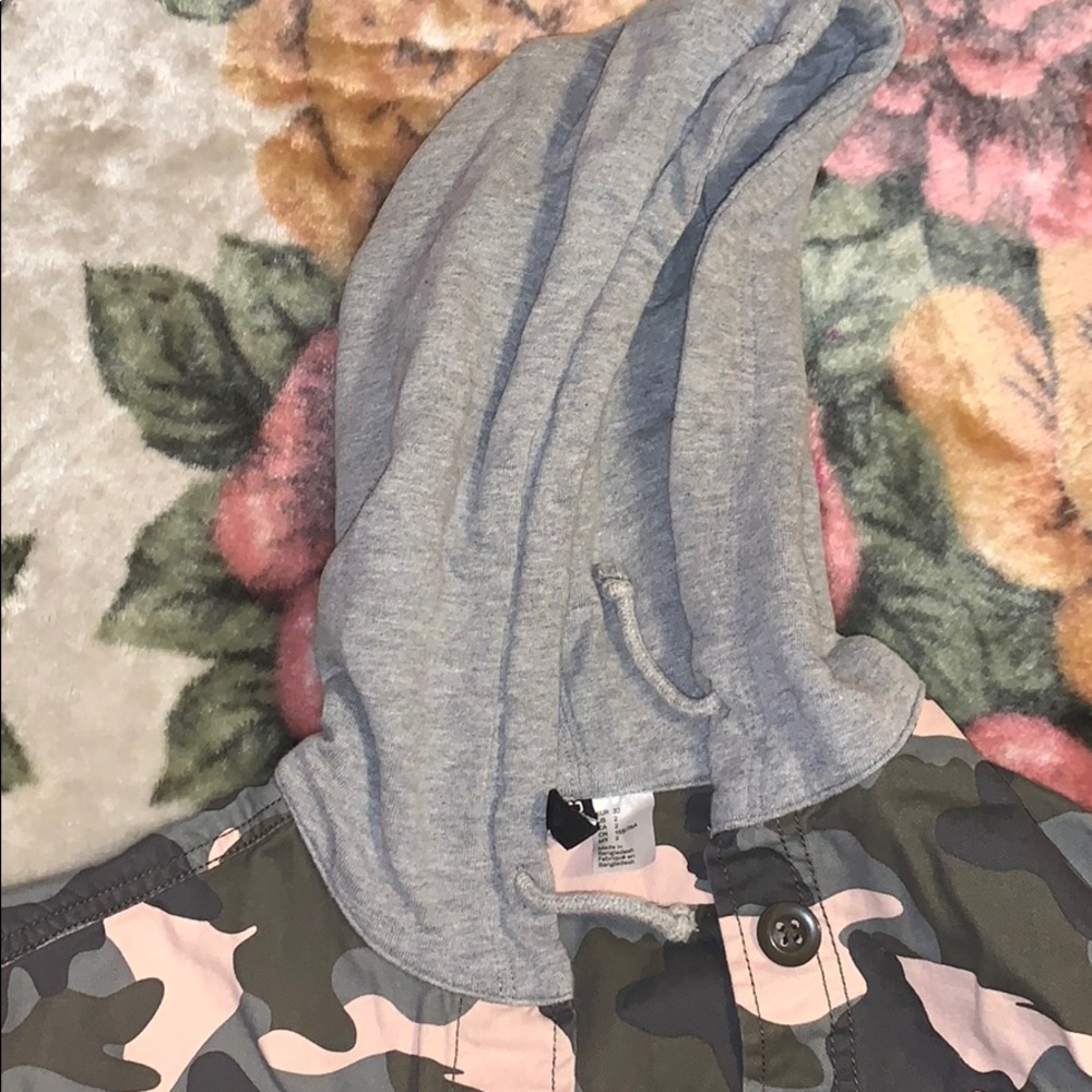 pink camouflage zip up hoodie.